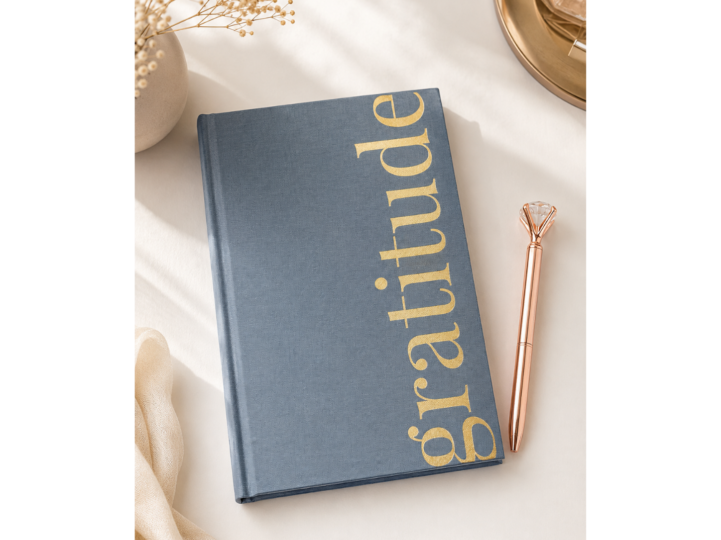 Gold foil hardcover gratitude journal from She Manifested